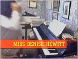 Click to see Miss Denise Hewitt play Bach's Short Prelude - 4  - wearing her Pink Woven Mini-Skirt and Satin White Blouse